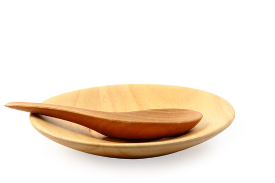 Wooden plate and tablespoon isolated clipping path.