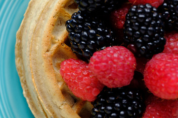 Waffles with raspberries and blackberries for breakfast