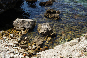 Rocky bay with giant boulders daytime
