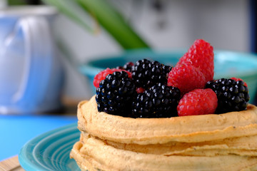 Waffles with raspberries and blackberries for breakfast