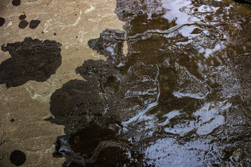 wet stone, dark gray background