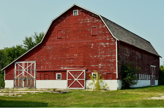 Old weathered red barn in rural Illinois