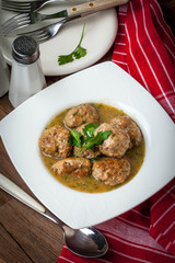 Pork meatballs with dill sauce.