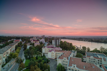 Aerial view in Ivano - frankivsk city, main street and lake at sunset