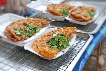 Crispy fried mussels with egg