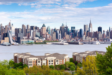 New York City midtown Manhattan skyline panorama view from Boulevard East Old Glory Park over...
