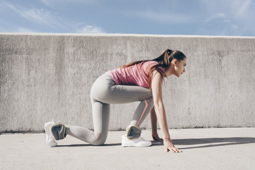 active sports girl jogging in the open air, wants to lose weight and a beautiful figure