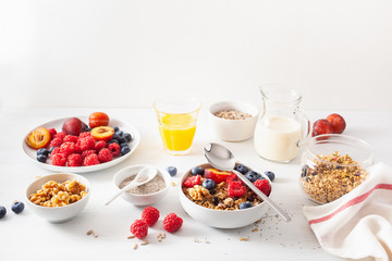 healthy granola for breakfast with berry fruit nut, vegan milk