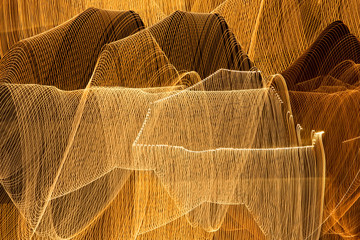 Orange, yellow and brown light lines for background. Abstract photography by long exposure.