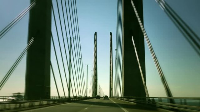 Bridge between Sweden and Denmark. &Ouml;resundsbron. View from passenger seat of car. Timelapse.