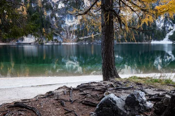 Zelfklevend Fotobehang Fall scenery of lake Braies. Lago di Braies at Alps background in South Tyrol in Italy. © Nickolay Khoroshkov