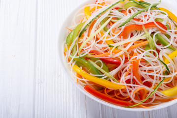Salad from rice noodles with vegetables