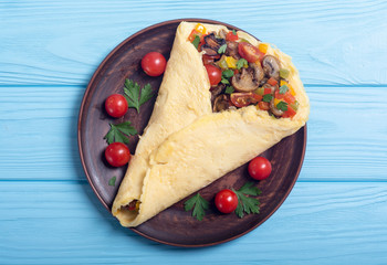 Omelette stuffed with vegetables