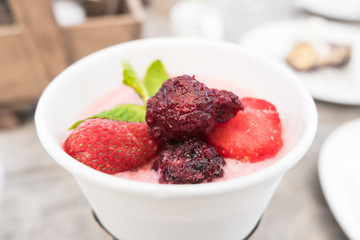 strawberries smoothie with strawberries,top view.