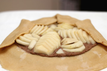 Making a pear and almond galette. Selective focus. 