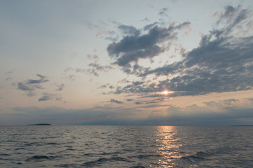 Fototapeta na wymiar Gorgeous landscape with dawn clouds and sunrise on Georgian bay