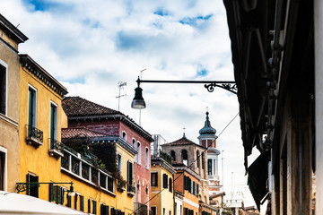 Fototapeta na wymiar Traditional street view of old buildings in Venice, ITALY