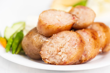Thai sausage, fermented rice with pork sausage served with vegetables
