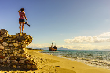 Tourist take photo on beach sea shore
