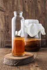 Obraz na płótnie Canvas Homemade fermented raw kombucha tea. Healthy natural probiotic flavored drink. Copy space