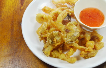 crispy batter-fried oyster mushroom with flour dipping sweet chili sauce