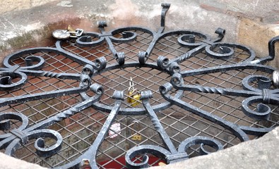 Love padlocks on old fountain