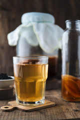 Homemade fermented raw kombucha tea. Healthy natural probiotic flavored drink. Copy space
