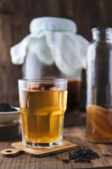 Homemade fermented raw kombucha tea. Healthy natural probiotic flavored drink. Copy space