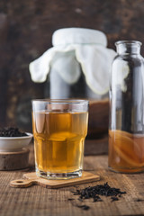 Homemade fermented raw kombucha tea. Healthy natural probiotic flavored drink. Copy space