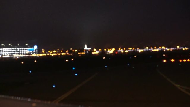 Amsterdam international airport building view from landing blur motion video