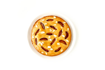 Whole Homemade Plum Cake isolated on White Background