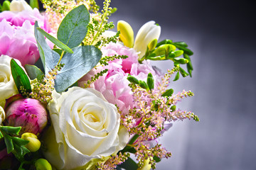 Composition with bouquet of freshly cut flowers