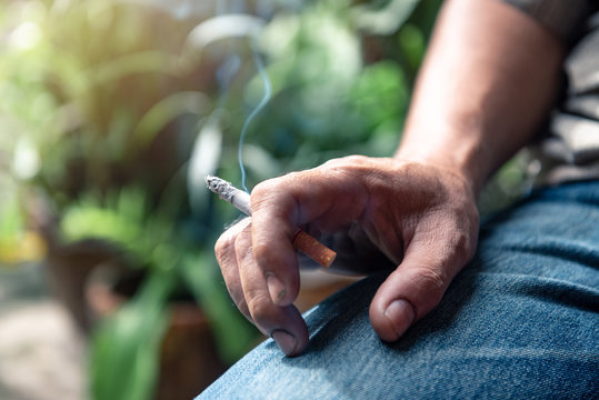 Hand Holding Cigarette