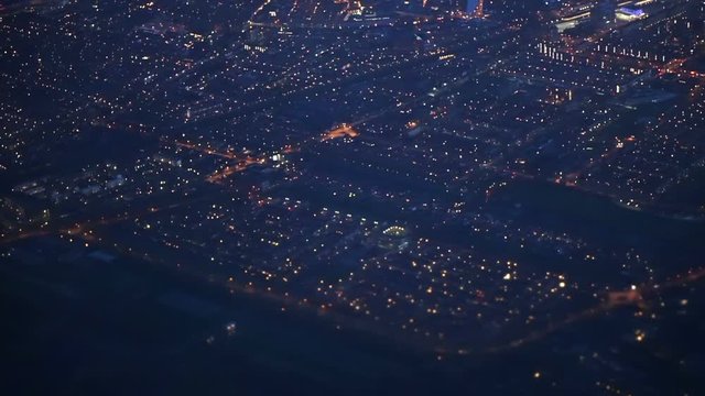 Amsterdam city, Netherlands plane aerial view at twilight night