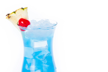 Blue Hawaiian cocktail on white background. Copyspace

