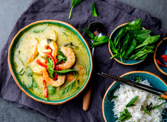 THAI SHRIMPS GREEN CURRY. Thailand tradition green curry soup with shrimps prawns and coconut milk....