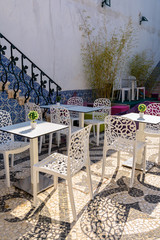 Picturesque outdoors bar in European village.