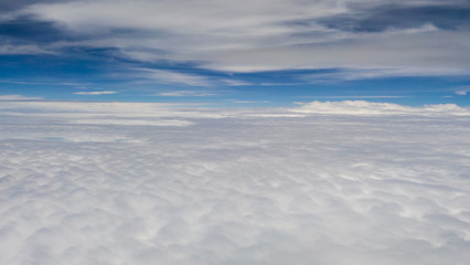 Fototapeta na wymiar Cloud and blue sky from the airplane windows