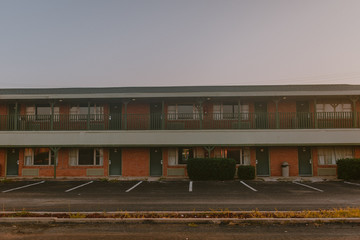 a motel in the middle of the road in texas - road trip