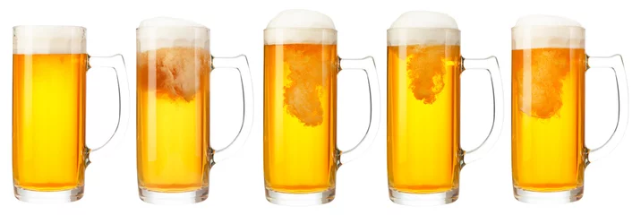 Foto auf Leinwand Set of mugs of cold light beer with foam isolated on white background © gornist