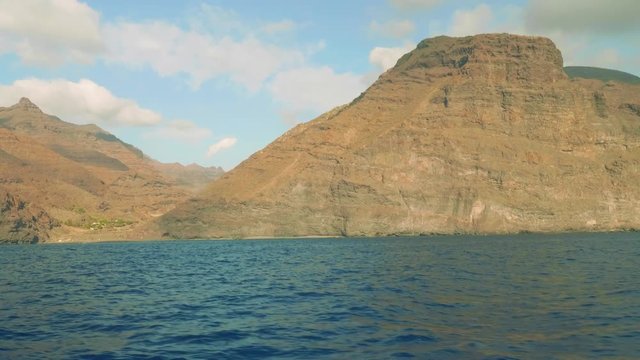 Opening view of ricky clove of Gran Canaria island. View from sailing yacht