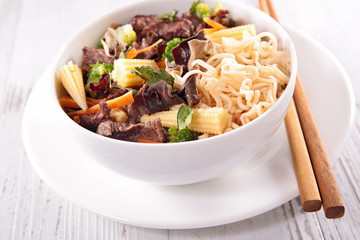 bowl of noodles with beef