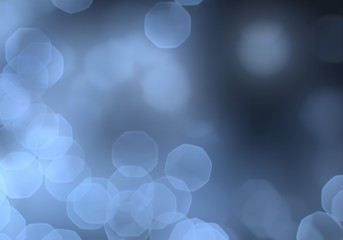 Bright lights defocused on black, dark background.