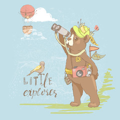 Fototapeta premium Cute little hand drawn baby bear traveller, adventurer with a binoculars and a hat, looking at airballoon