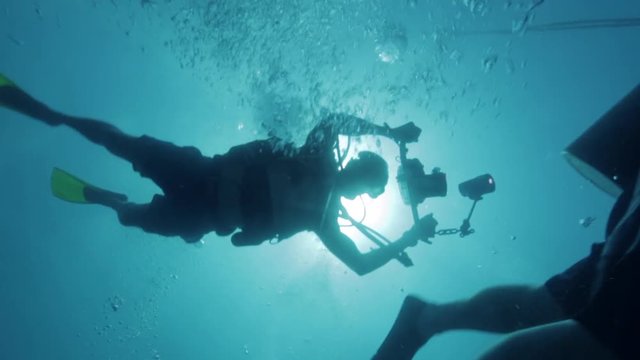 Scuba diving on world war 2 wreckage. Shot in the Solomon Islands.