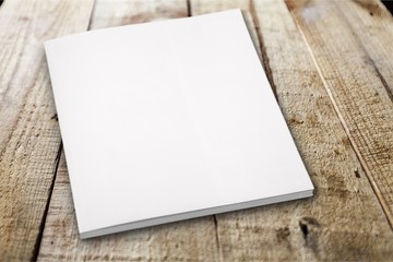 Pile of blank paper on wooden table