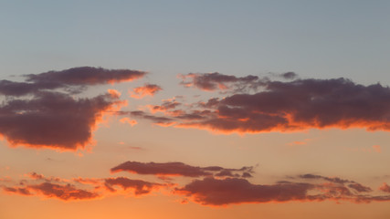 Colorful dramatic sky with cloud at sunset. Background