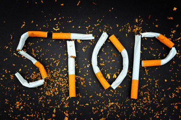 Created word STOP from cigarettes