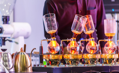 Showcase Syphon Coffee maker by syphonist./ Syphon Coffee or Vacuum Coffee is full immersion tasteful and picture show boiling water, stunning vacuum process by Beam heater.