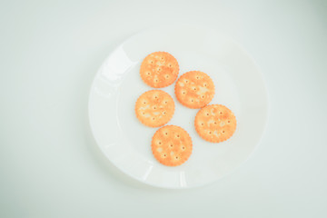 Round cookie on white background